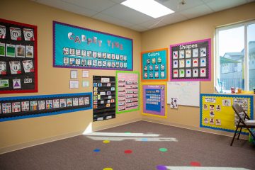 Carpet time area with lots of educational materials on the walls at a Brigthen Academy Preschool classroom